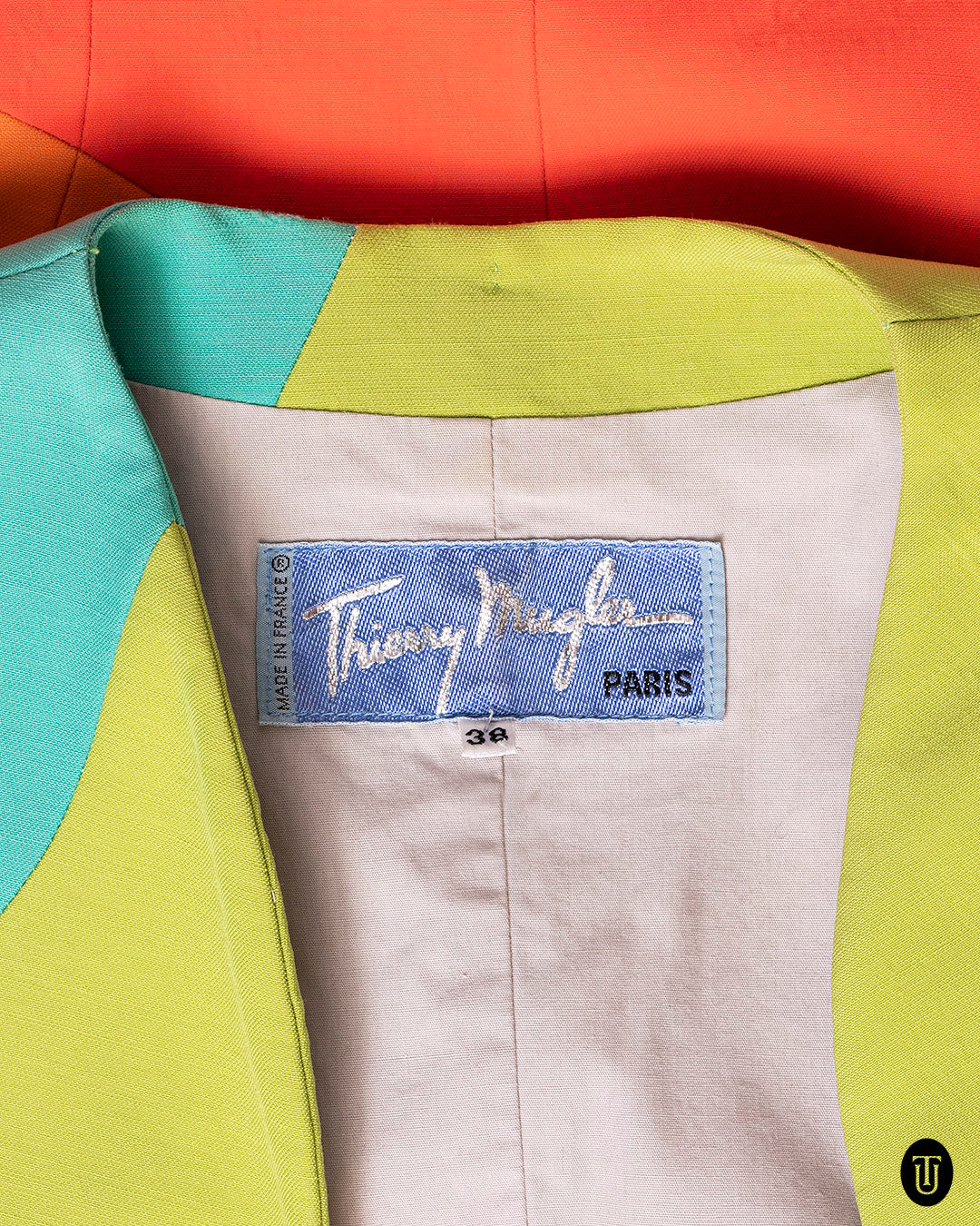 An iconic 90s Thierry Mugler Rainbow suit S